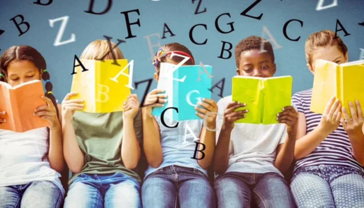 depositphotos_84427520-stock-photo-children-reading-books-at-park